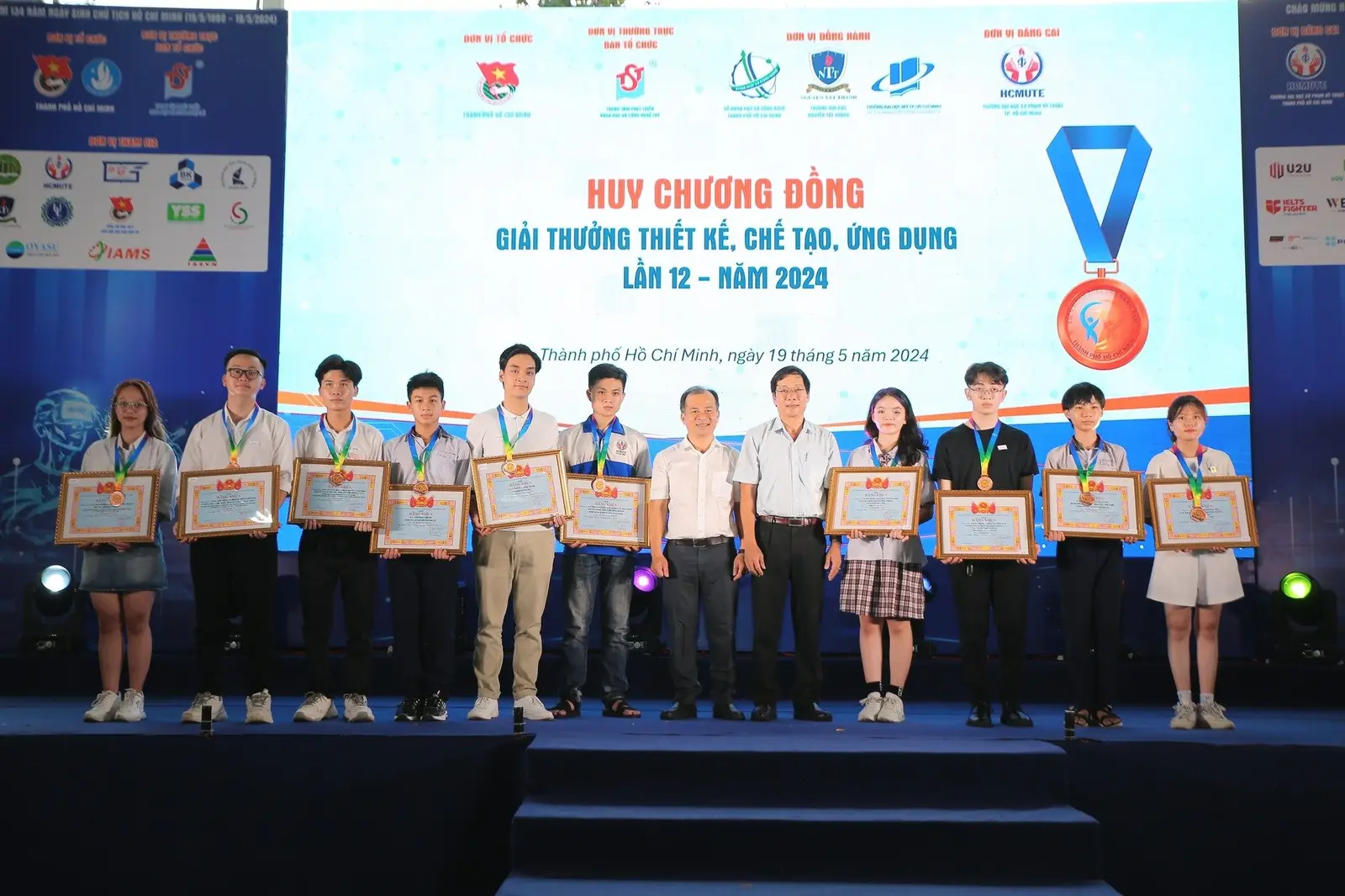 Award ceremony on stage: Bronze Medal, 12th Design, Fabrication & Application Award, Ho Chi Minh City, 2024
